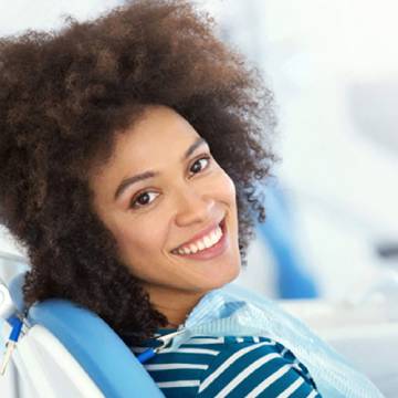 A girl At Knight Dental Care to get Dental Crowns in Little Rock, AR